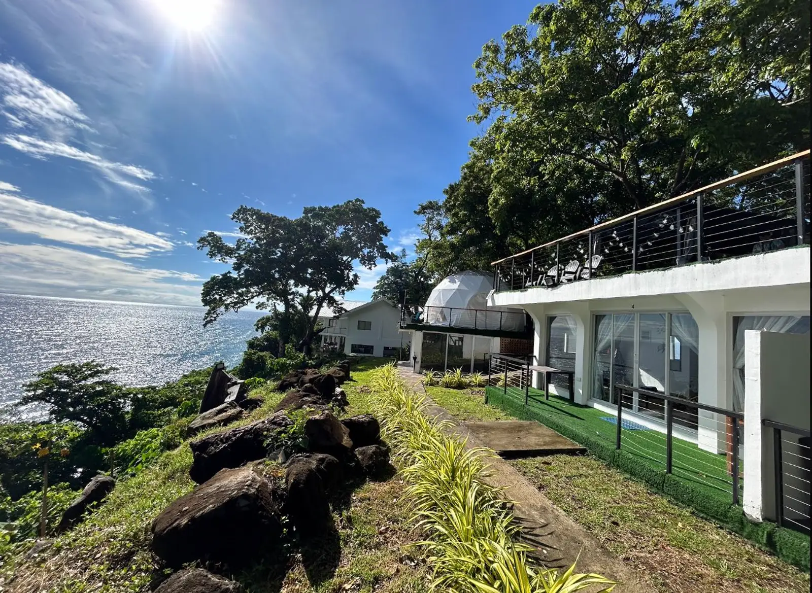 A private terrace overlooking the Bohol Sea at Txaleta de Camiguin